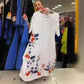 Nyomtatott, kerek nyakú női ruha szabálytalan szegéllyel